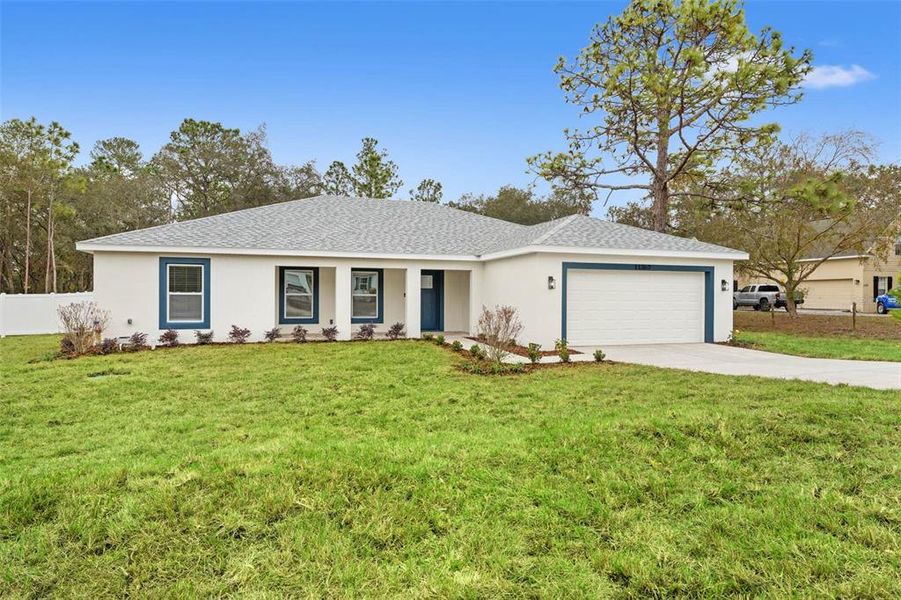Front exterior of a new home in , Brooksville, FL, highlighting curb appeal (Image 24). Front exterior of a new home in , Brooksville, FL, highlighting curb appeal (Image 24).