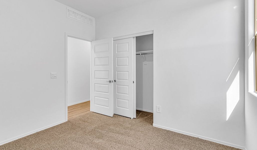 Spacious, unfurnished interior of a new home in Coronet at Gladden Farms, Marana (Image 29). Spacious, unfurnished interior of a new home in Coronet at Gladden Farms, Marana (Image 29).