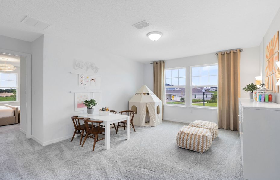 Furnished interior view inside a new home in Silverleaf Oaks, Winter Garden (Image 10).