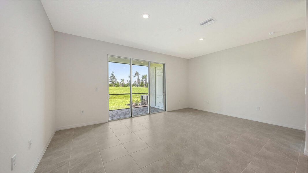 Spacious, unfurnished interior of a new home in Palm Grove Real Estate and Homes for Sale in Lakewood Ranch, FL - Neal Communities, Lakewood Ranch (Image 25).
