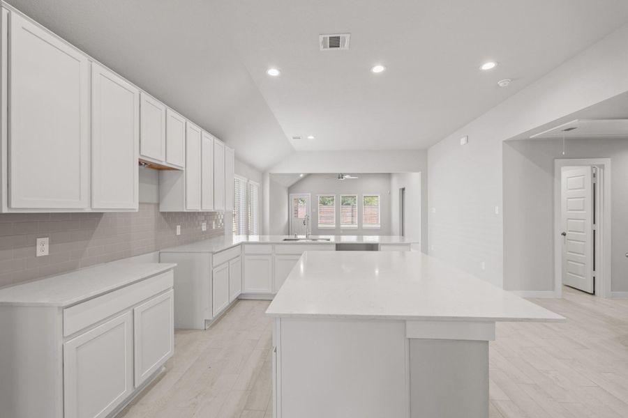 Furnished interior view inside a new home in Sunterra North, Katy (Image 5).