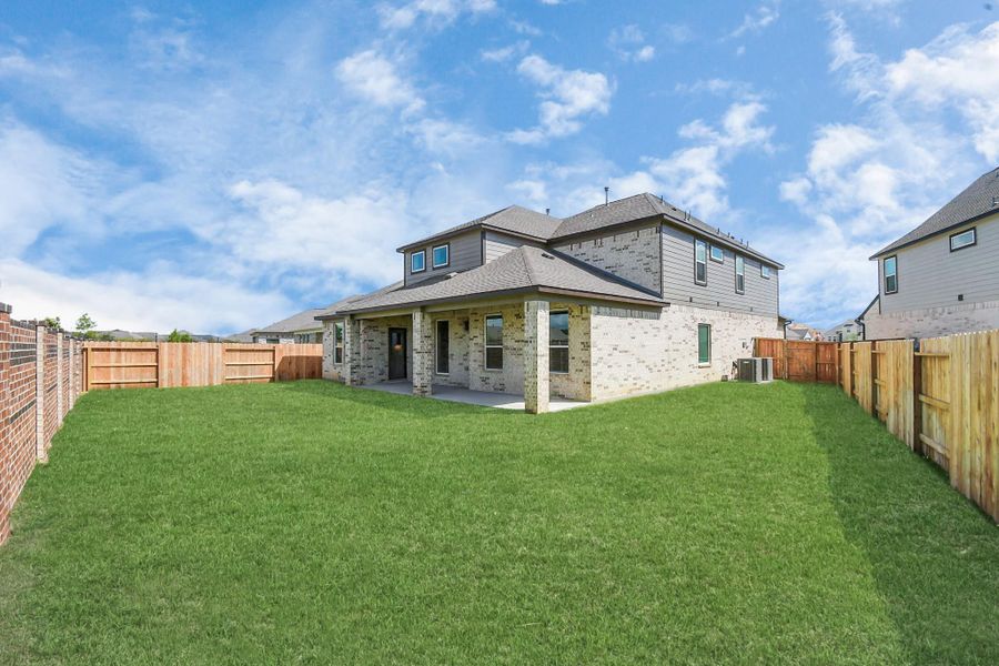 Sample photo of completed home with similar floor plan. Actual colors and selections may vary.