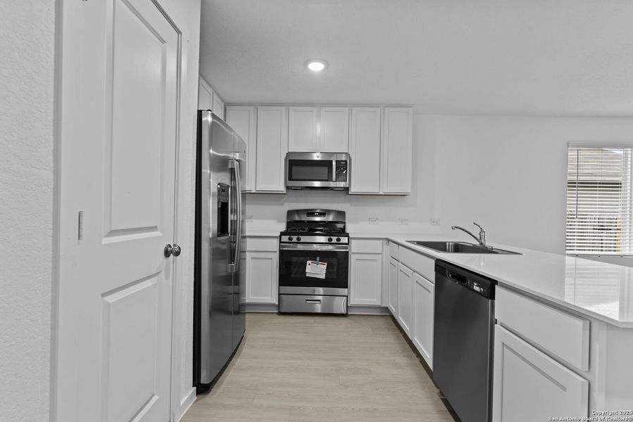 Furnished interior view inside a new home in , Floresville (Image 7).