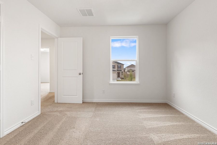 Spacious, unfurnished interior of a new home in Woodside Farms, Seguin (Image 15).