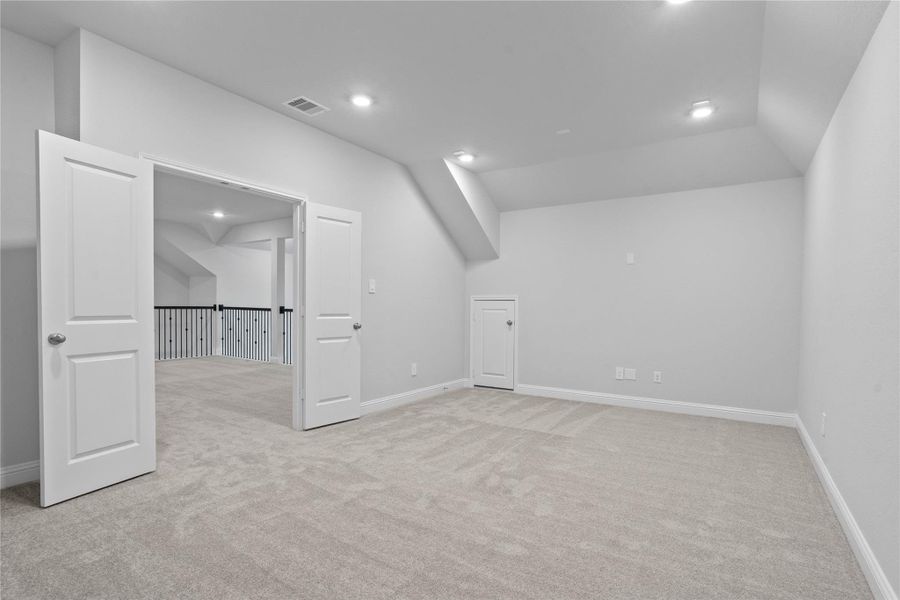 Grab the popcorn, put on a movie, and enjoy a wonderful evening in your amazing media room! Featuring plush carpet, custom paint, custom lighting makes this the perfect room for relaxing!