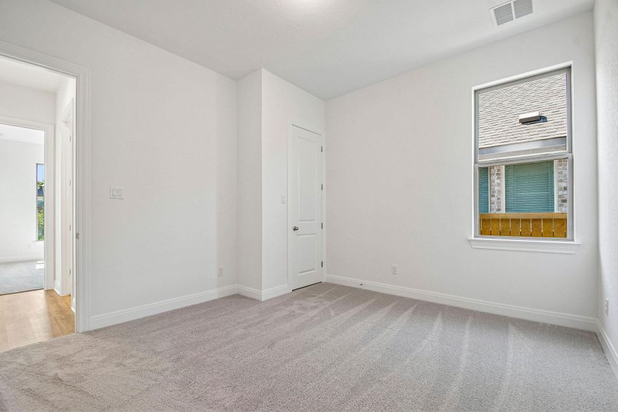 Spacious, unfurnished interior of a new home in 6 Creeks, Kyle (Image 24).