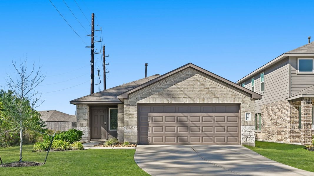 Front exterior of a new home in Breckenridge Forest, Spring, TX, highlighting curb appeal (Image 1). Front exterior of a new home in Breckenridge Forest, Spring, TX, highlighting curb appeal (Image 1).