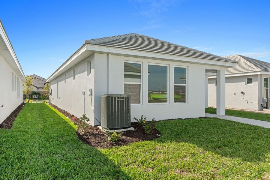Representative exterior photo of a completed home built from the The Boundary by David Weekley Homes in Vistera of Venice – Cottage Series, Nokomis, FL (Image 1).