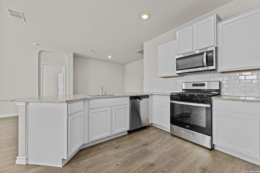 Furnished interior view inside a new home in Redbird Ranch, San Antonio (Image 9).