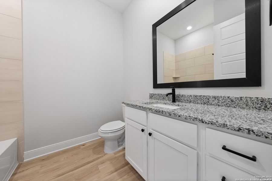 Furnished interior view inside a new home in Potranco West, Castroville (Image 11).