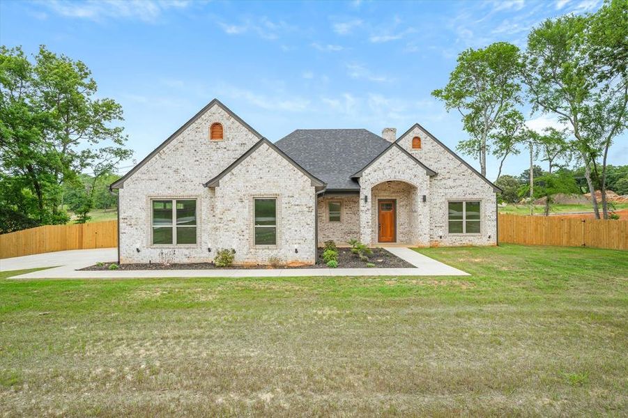 Front exterior of a new home in , Lindale, TX, highlighting curb appeal (Image 26).