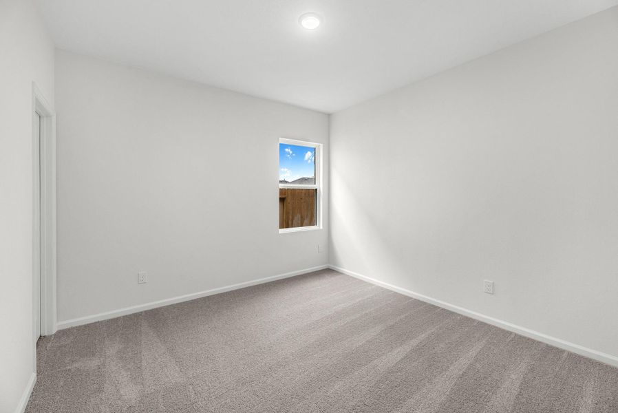 Representative unfurnished interior of a home built from the Hawking by Starlight Homes in Hawks Run, Kissimmee (Image 13).