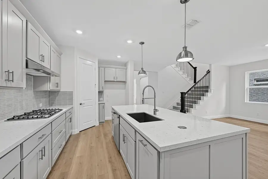 Furnished interior view inside a new home in South Oak, Lakewood Village (Image 7).