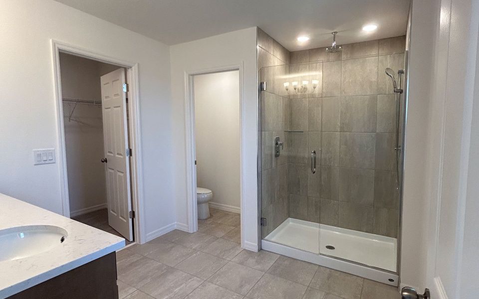 Modern Primary Bathroom with Stylish Features in Central Florida House