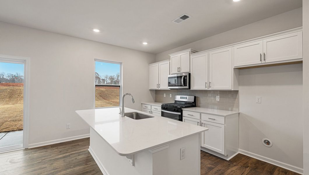 Furnished interior view inside a new home in Hunters Ridge, Woodruff (Image 8).