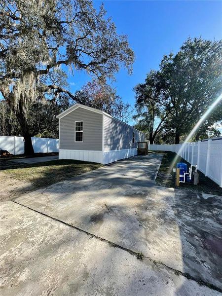 Exterior details and patio area of a home in , New Port Richey (Image 22).