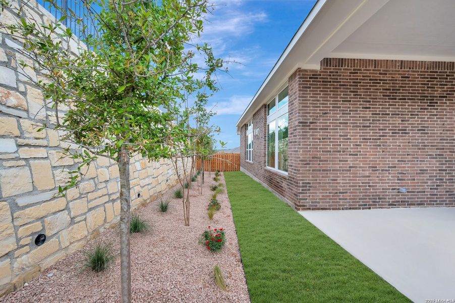 Exterior details and patio area of a home in Windsong - Legacy Series, Boerne (Image 28).