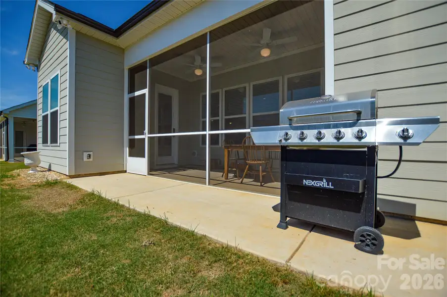 Exterior details and patio area of a home in Edgewater Lakeview On Your Lot, Lancaster (Image 4).