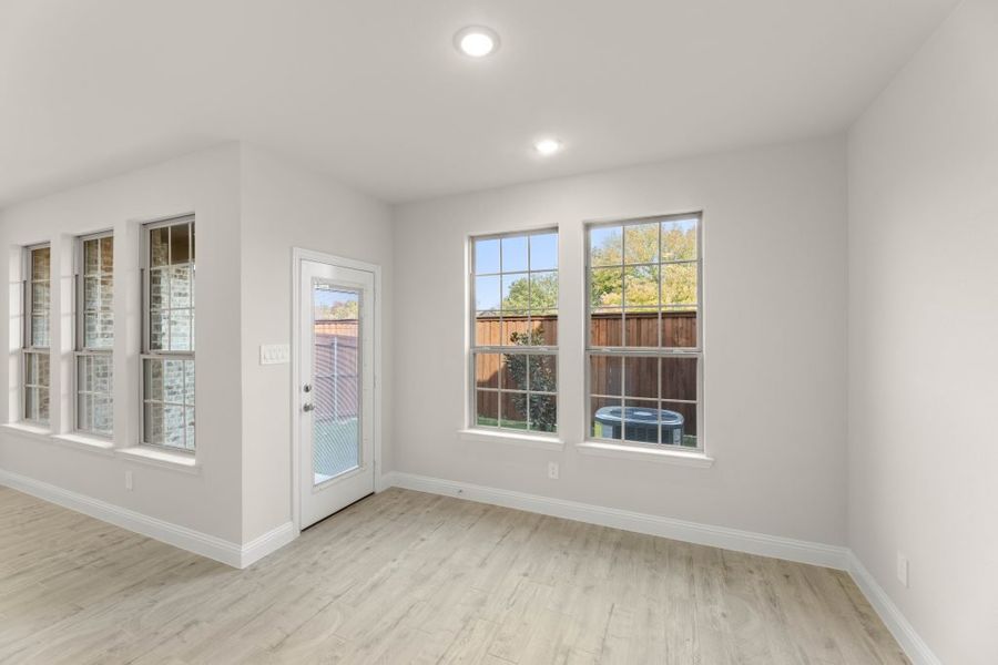 Front exterior of a new home in Main Street Village, Mansfield, TX, highlighting curb appeal (Image 12). Front exterior of a new home in Main Street Village, Mansfield, TX, highlighting curb appeal (Image 12).