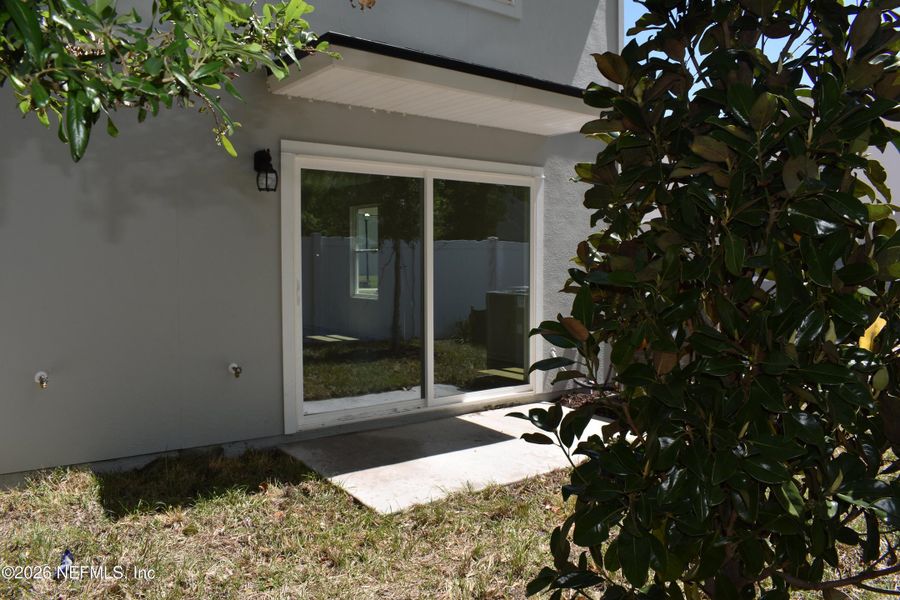 Exterior details and patio area of a home in Irongate Villas, Jacksonville (Image 3).