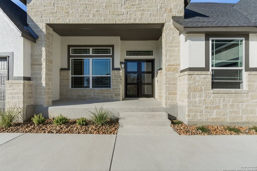 Exterior details and patio area of a home in Caliza Reserve, Boerne (Image 26).
