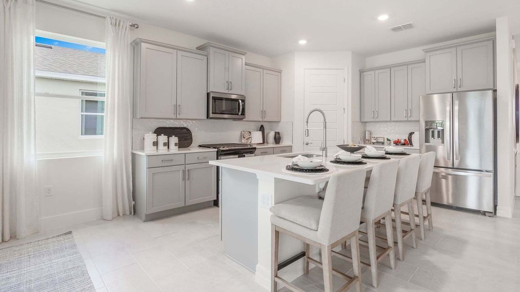Representative furnished interior of a home built from the DELRAY by D.R. Horton in Lakes of Mount Dora, Mount Dora (Image 10).