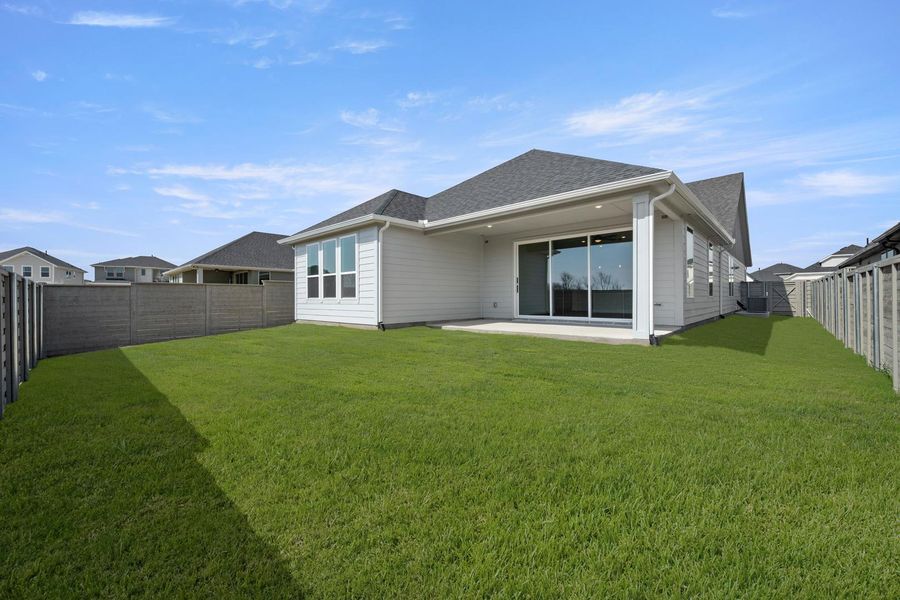 Exterior details and patio area of a home in Treeline, Justin (Image 3).