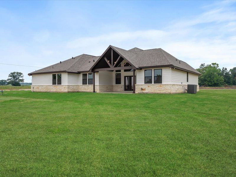 Front exterior of a new home in , Centerville, TX, highlighting curb appeal (Image 26). Front exterior of a new home in , Centerville, TX, highlighting curb appeal (Image 26).
