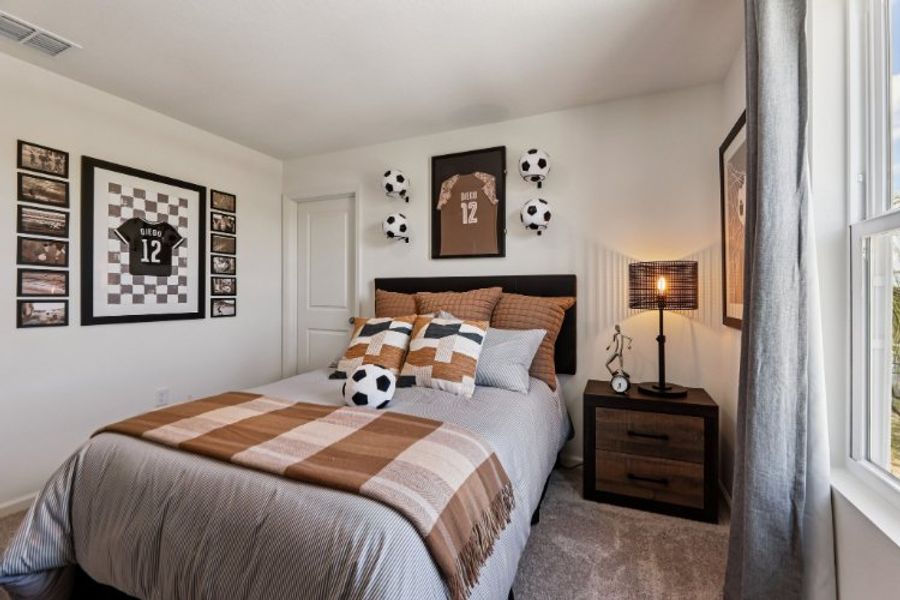 A cat on a bed. A cat on a bed.