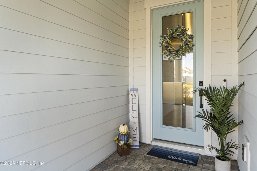 Exterior details and patio area of a home in Summer Bay at Grand Oaks, St. Augustine (Image 4).