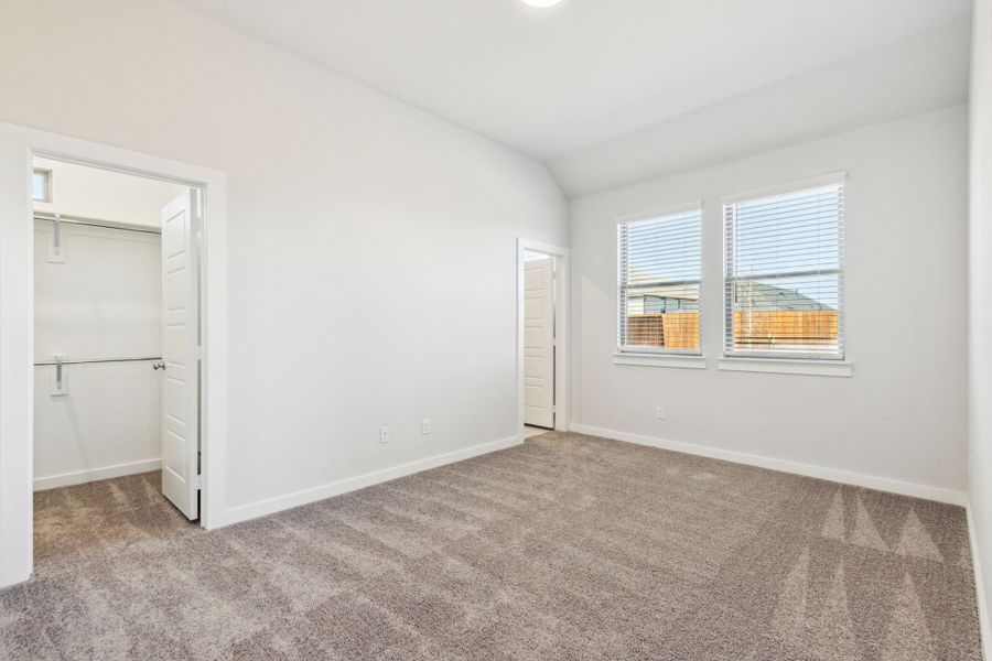 Bedroom in the Ash home plan by Trophy Signature Homes – REPRESENTATIVE PHOTO