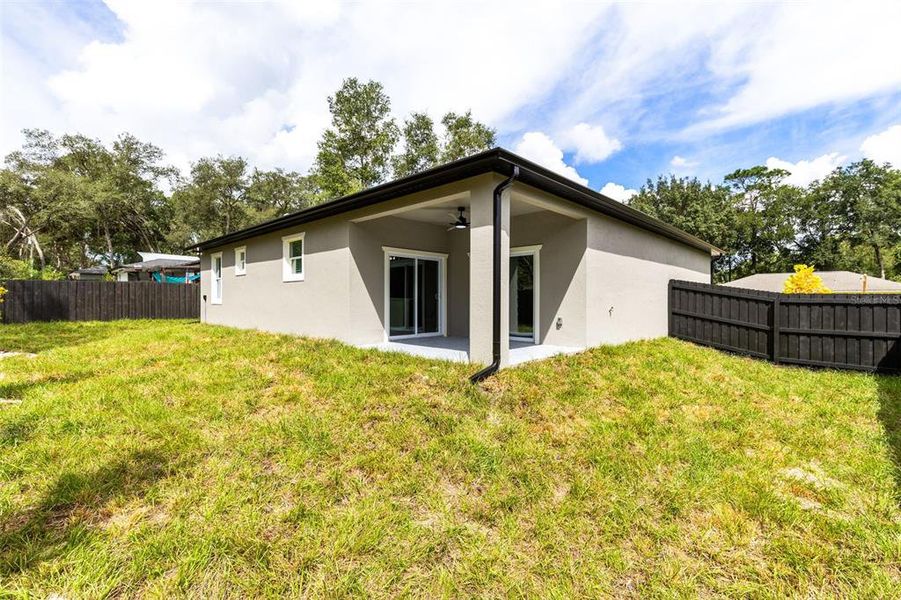 Front exterior of a new home in , Orange City, FL, highlighting curb appeal (Image 14).