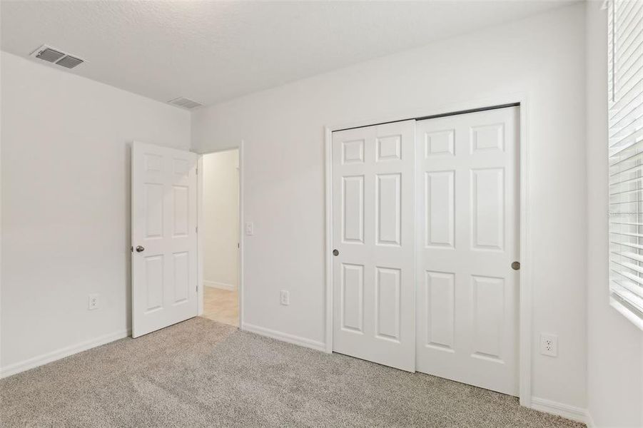 Spacious, unfurnished interior of a new home in Eden Hills, Lake Alfred (Image 28).