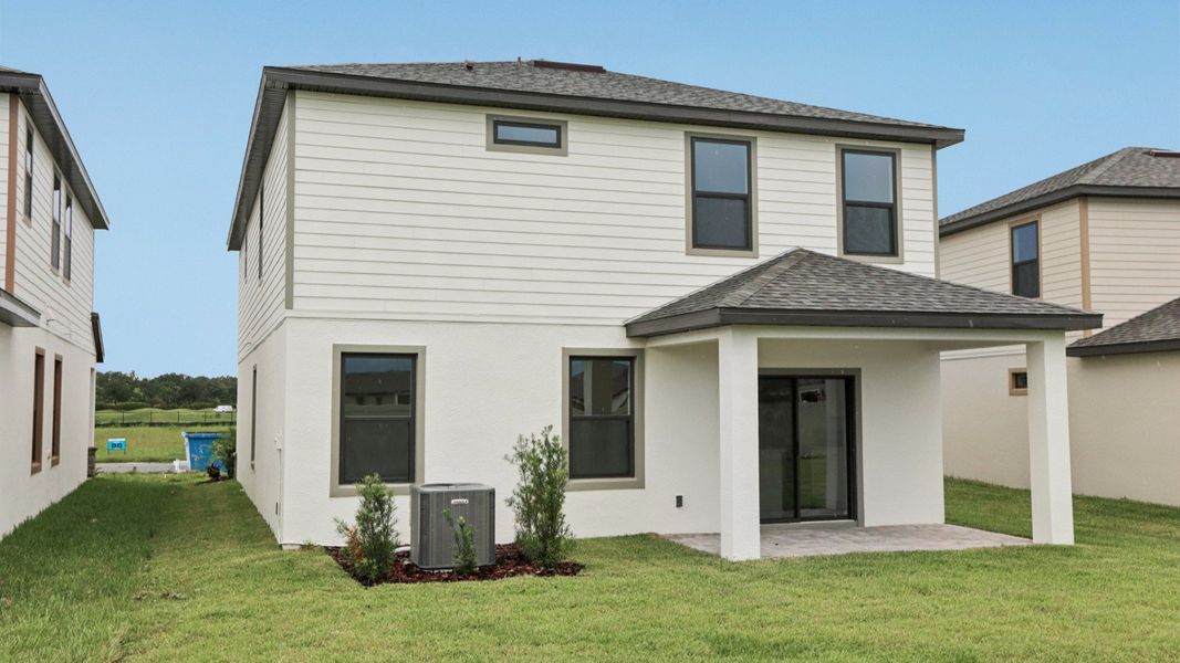 Representative exterior photo of a completed home built from the Ponte Vedra by DRB Homes in Grasslands West, Lakeland, FL (Image 25).