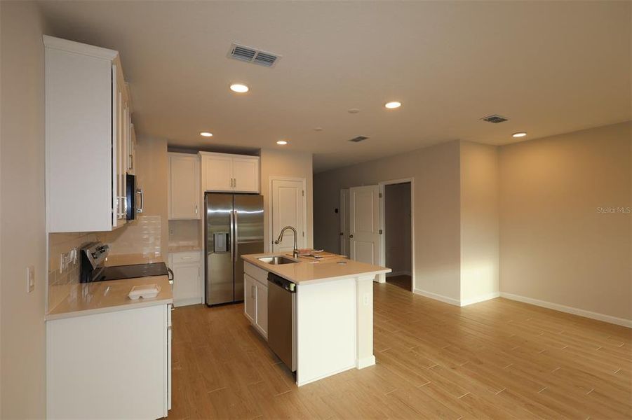 Furnished interior view inside a new home in Reeves Place, Orlando (Image 7).