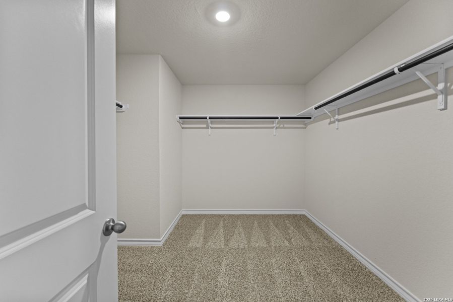 Spacious, unfurnished interior of a new home in Brookstone Creek, San Antonio (Image 21).