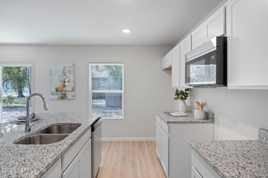 Furnished interior view inside a new home in , Jacksonville (Image 12).