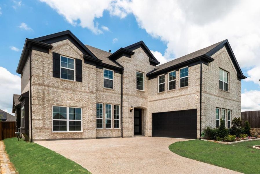 Front exterior of a new home in Buffalo Ridge, Celina, TX, highlighting curb appeal (Image 2). Front exterior of a new home in Buffalo Ridge, Celina, TX, highlighting curb appeal (Image 2).