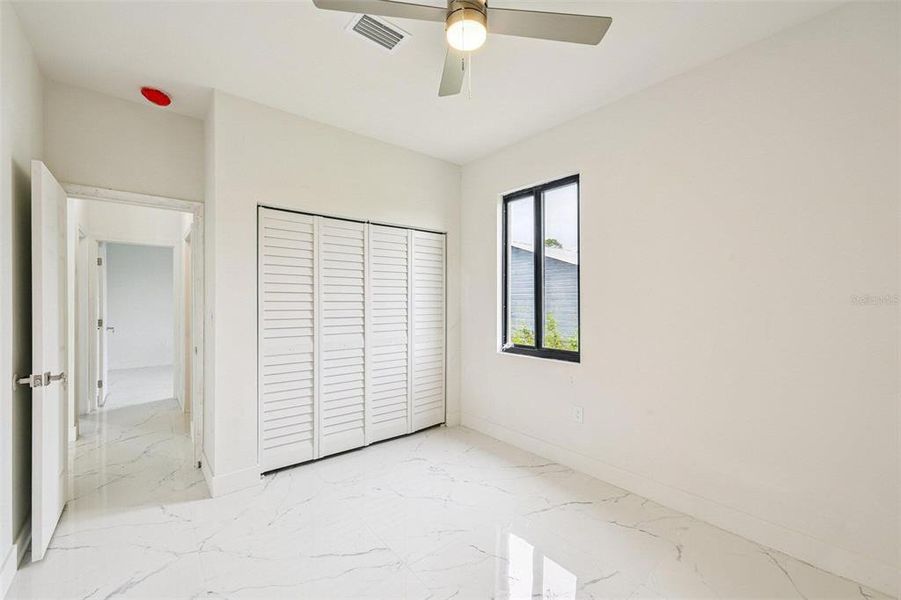 Spacious, unfurnished interior of a new home in , Port Charlotte (Image 15).