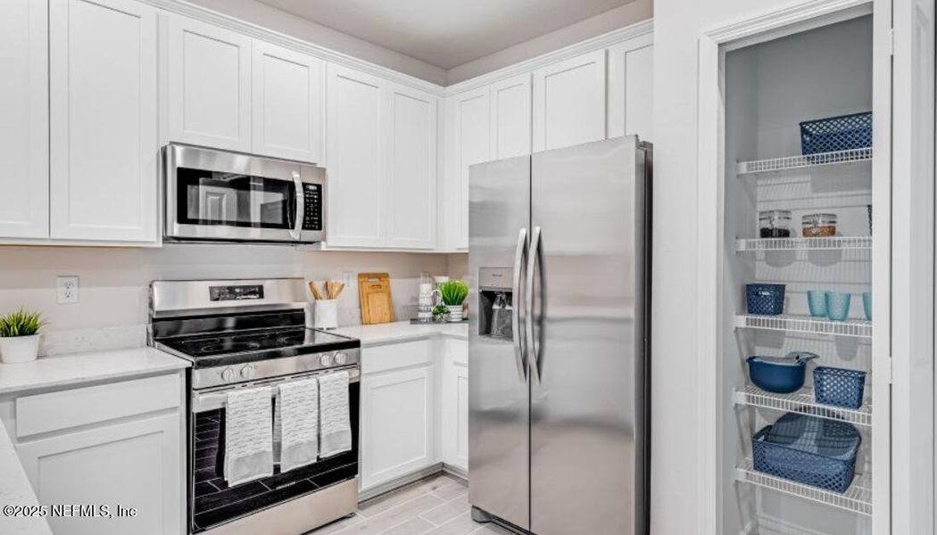 Furnished interior view inside a new home in Silver Falls Townhomes at Silverleaf, St. Johns (Image 16).
