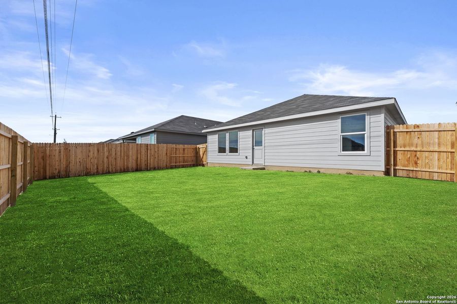 Exterior details and patio area of a home in Voss Farms, New Braunfels (Image 2).