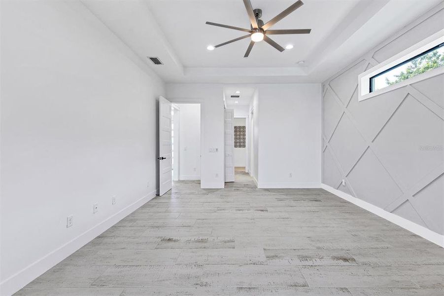 Spacious, unfurnished interior of a new home in , Port Charlotte (Image 40).