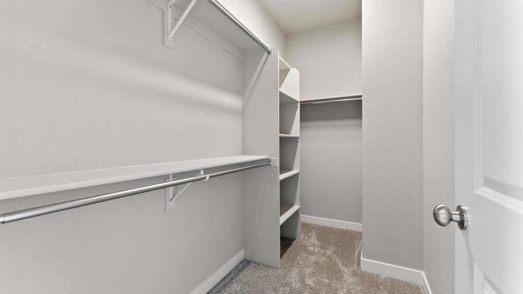 Primary Closet - Not Actual Home - Finishes May Vary