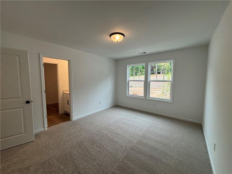 Spacious, unfurnished interior of a new home in Arbors at Richland Creek, Buford (Image 39).