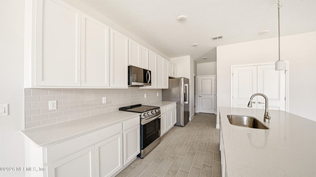 Furnished interior view inside a new home in , Palm Coast (Image 19).