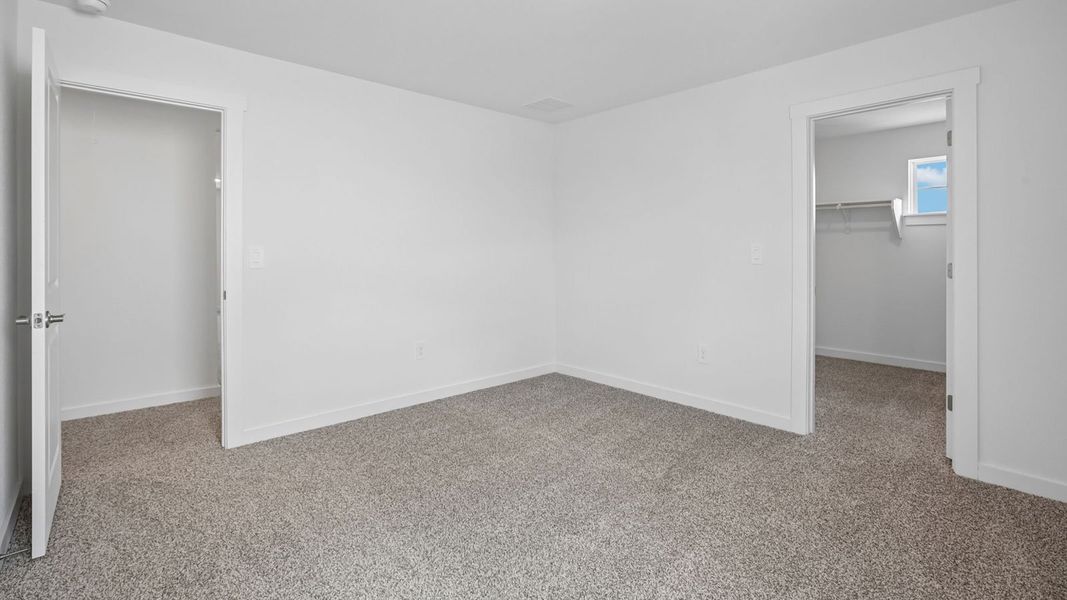 Spacious, unfurnished interior of a new home in Rosenbusch Ranch, Leander (Image 45).