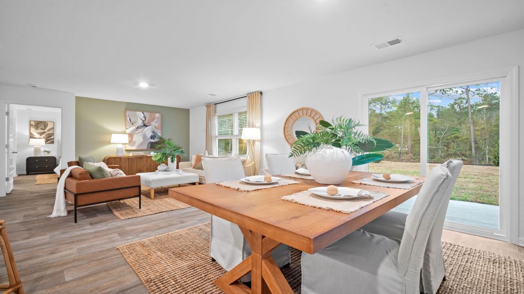 Representative furnished interior of a home built from the Freeport by D.R. Horton in Palm Ridge, Guyton (Image 7).