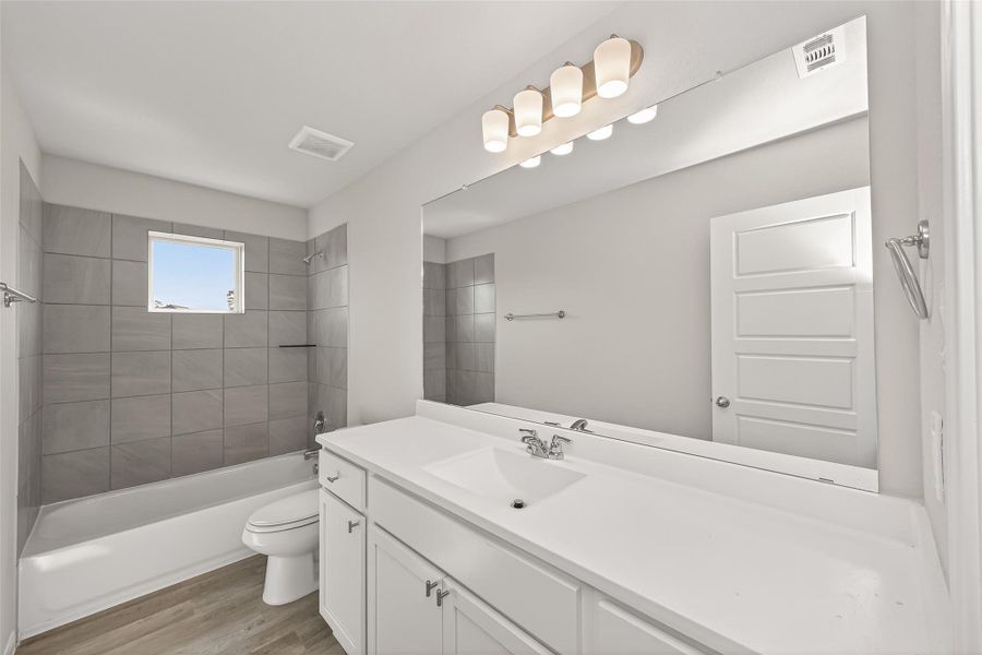 Furnished interior view inside a new home in Woodland Lakes, Houston (Image 11).