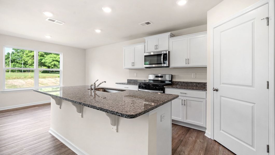 Furnished interior view inside a new home in Village Grove, Greenville (Image 8). Furnished interior view inside a new home in Village Grove, Greenville (Image 8).
