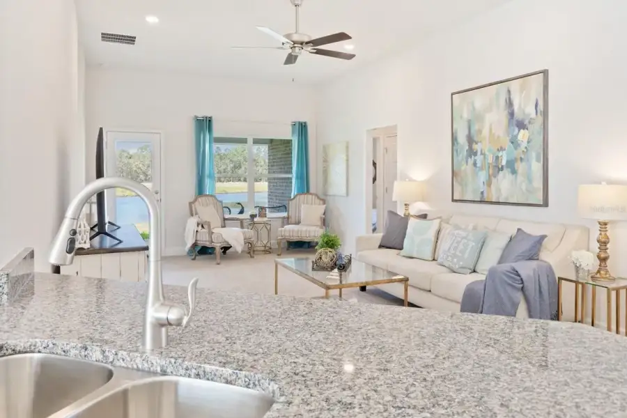 Representative furnished interior of a home built from the 1820 by Adams Homes in Flagler Estates, Hastings (Image 12).